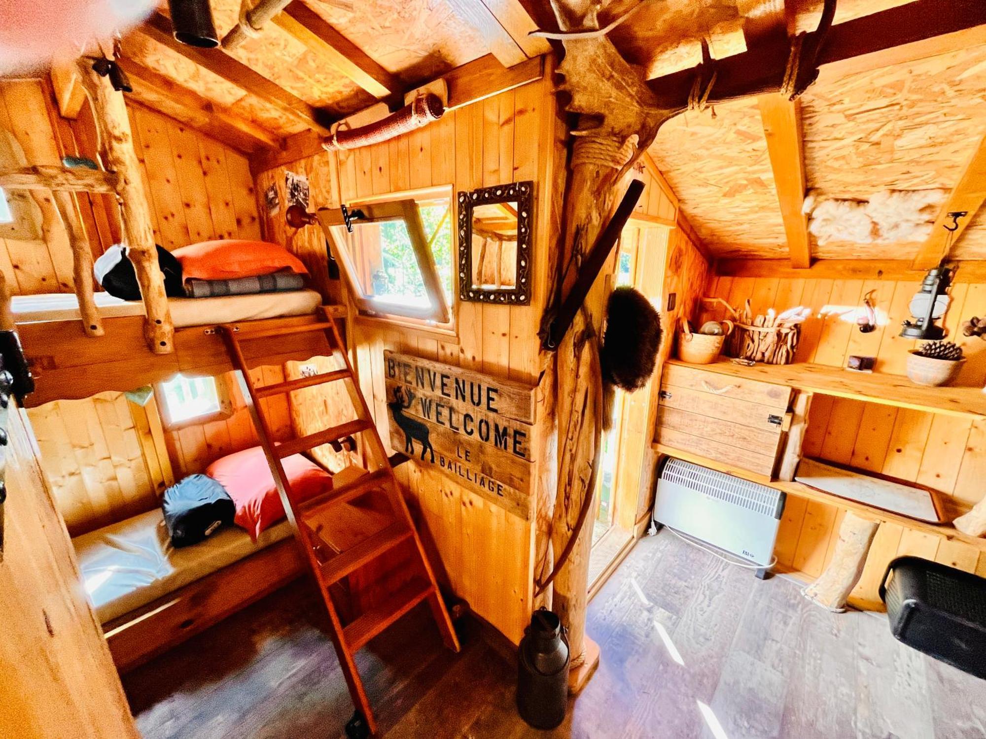 La Cabane Perchee Du Trappeur Écrainville Exteriör bild