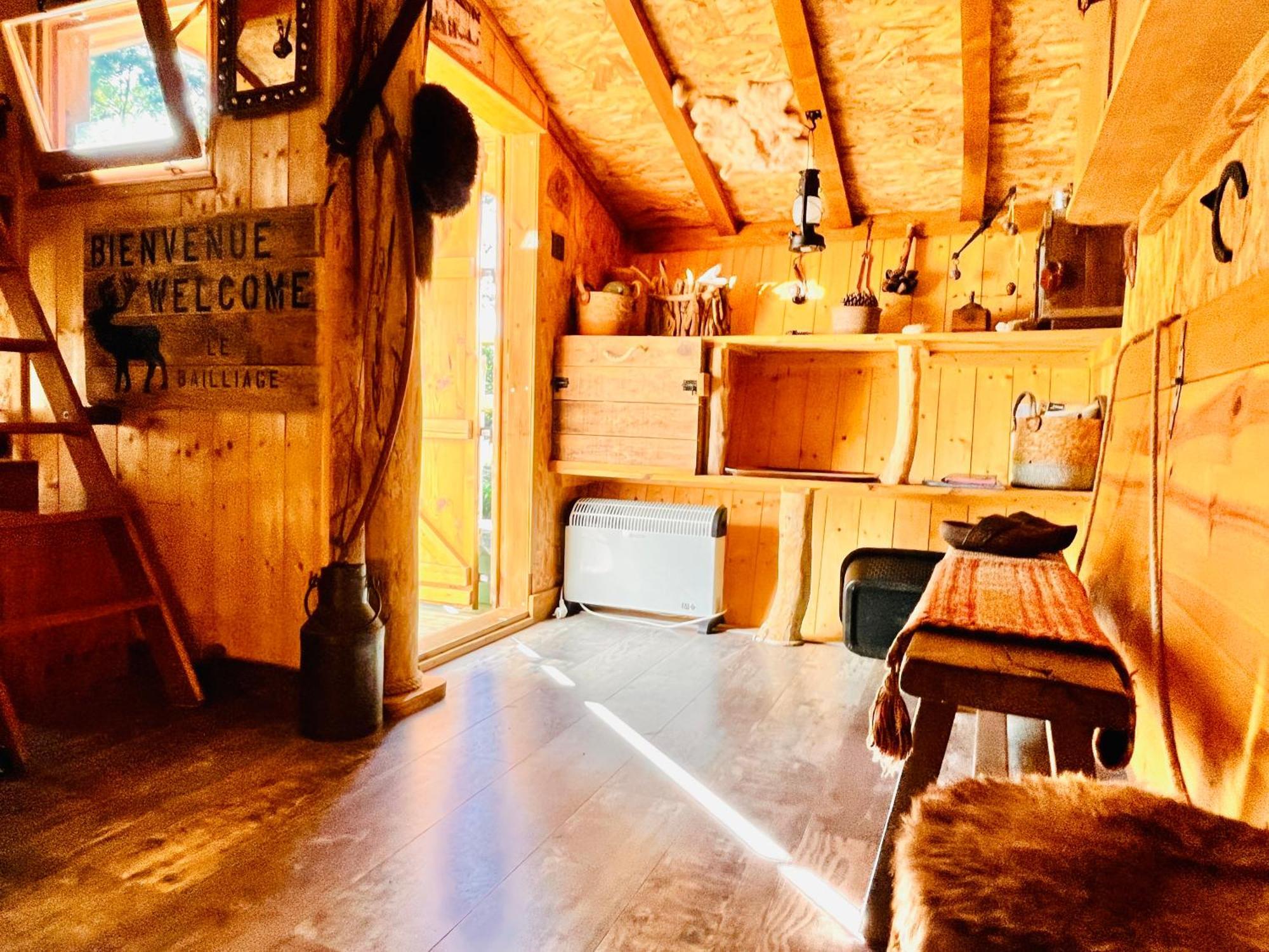 La Cabane Perchee Du Trappeur Écrainville Exteriör bild